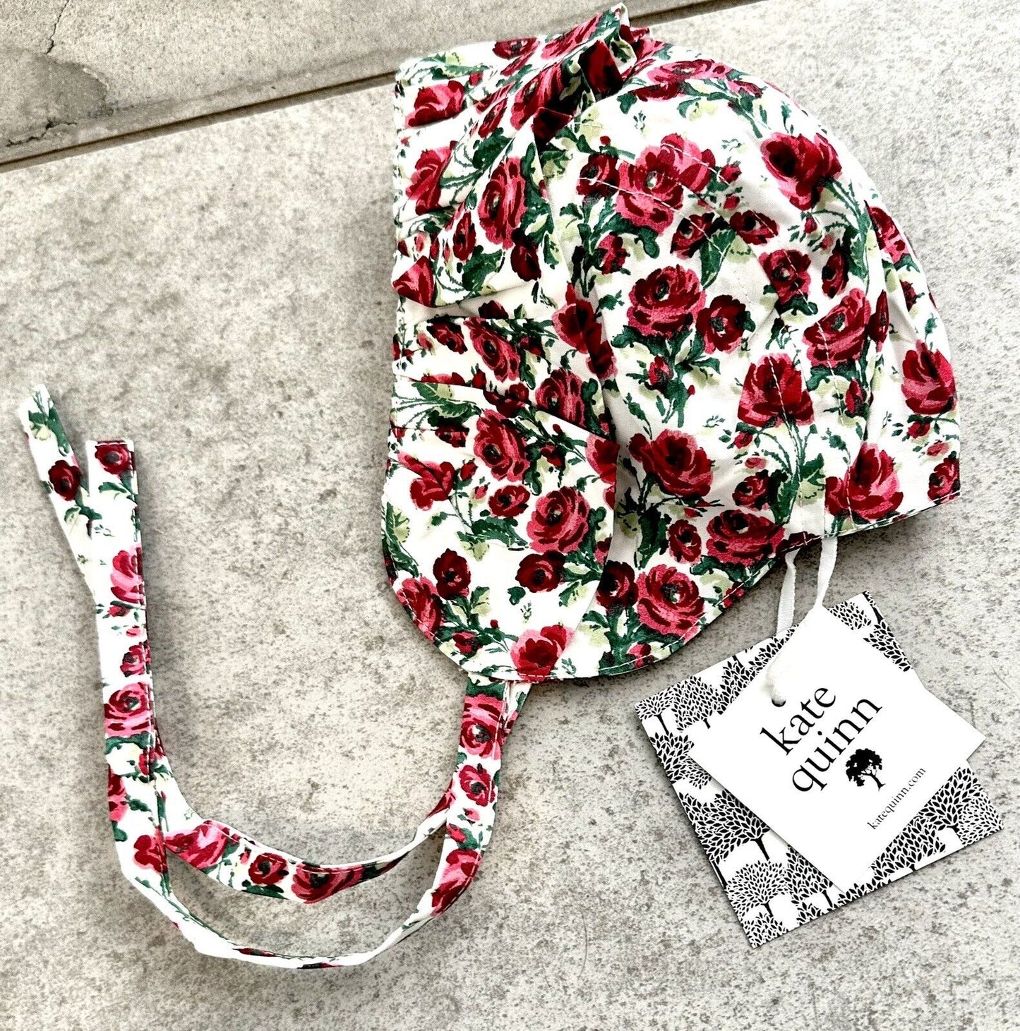 Kate Quinn Ruffle Bonnet Rose Design. Price $16 0-3 M