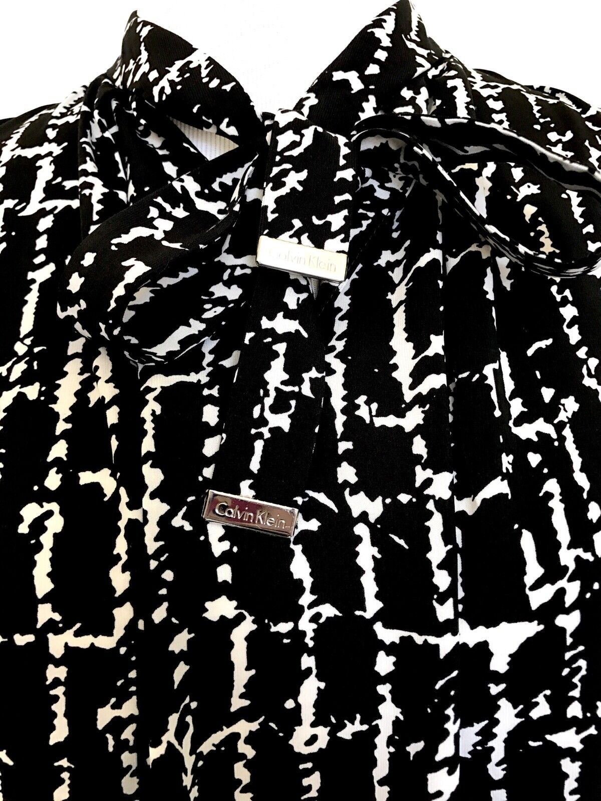 Calvin Klein Black & White Bow Neck Top . NWT Retails $59 Price $29 Size XS