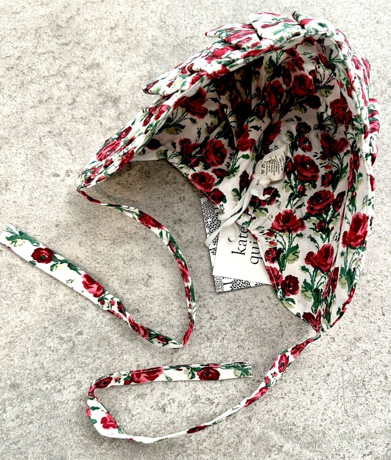 Kate Quinn Ruffle Bonnet Rose Design. Price $16 3-6 M