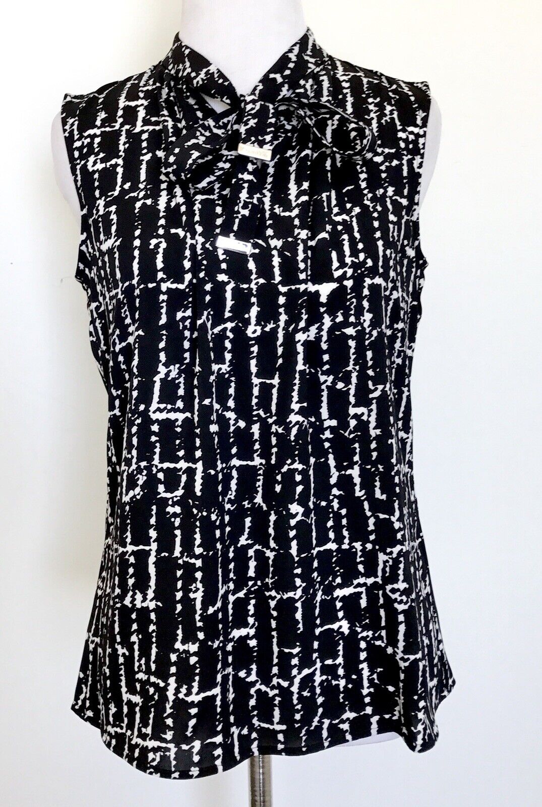 Calvin Klein Black & White Bow Neck Top . NWT Retails $59 Price $29 Size XS