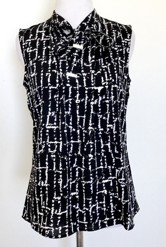 Calvin Klein Black & White Bow Neck Top . NWT Retails $59 Price $29 Size XS
