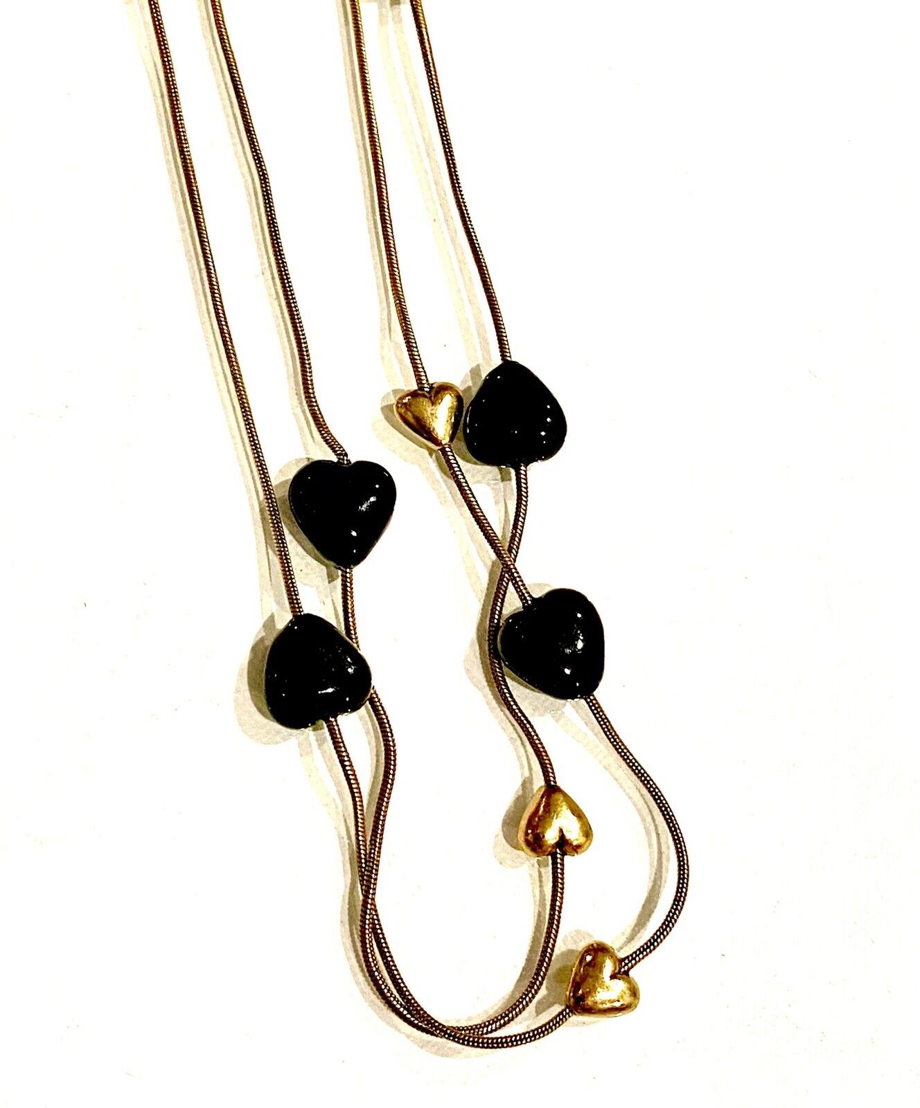 Pilgrim Jewelry 16 Carat Gold Plated Gold and black heart necklace. $15